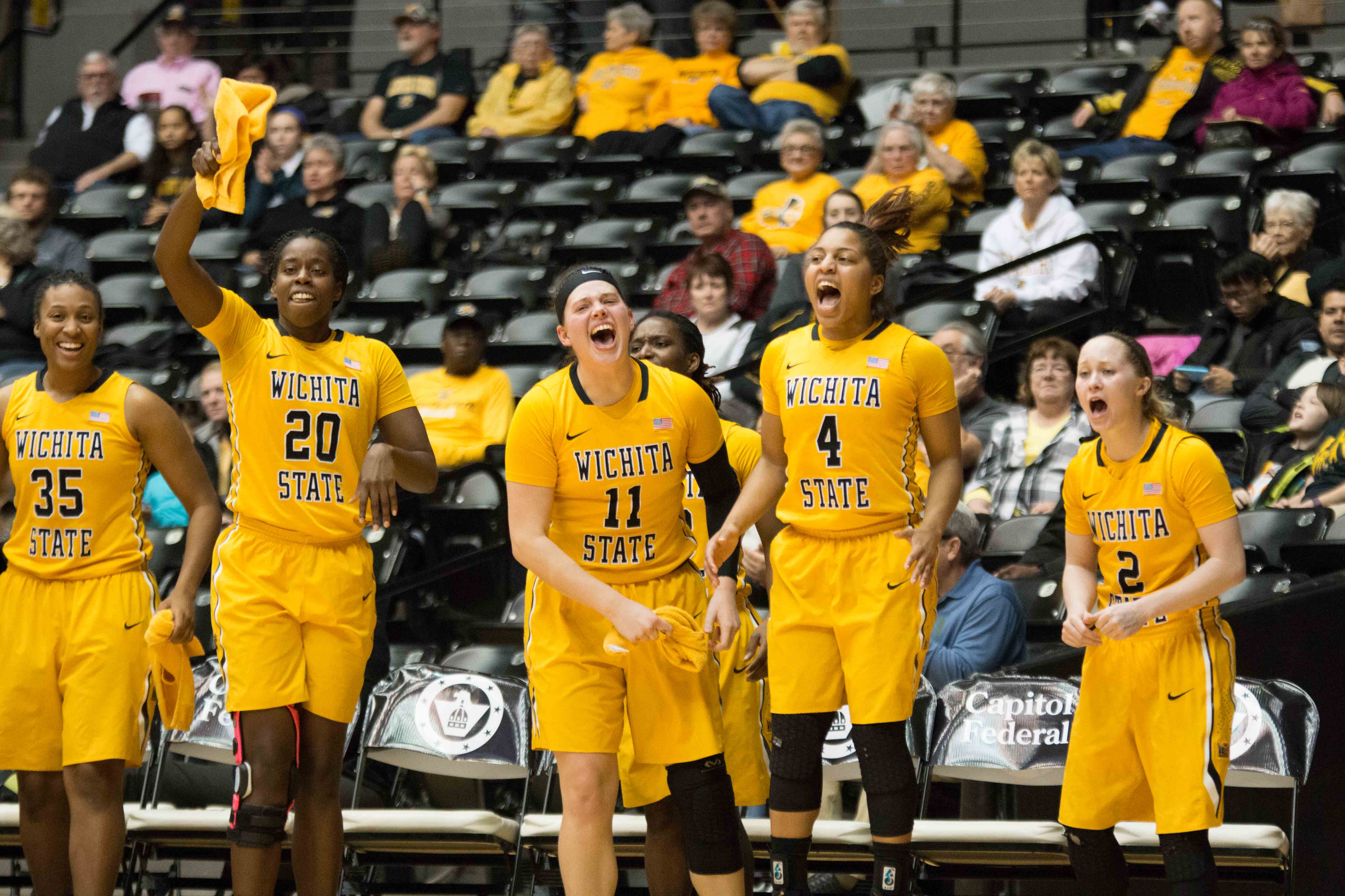 Shockers cheer on their teammates during first half of the game at Koch Arena. WSU has won its fourth straight game on Friday against Indiana State.