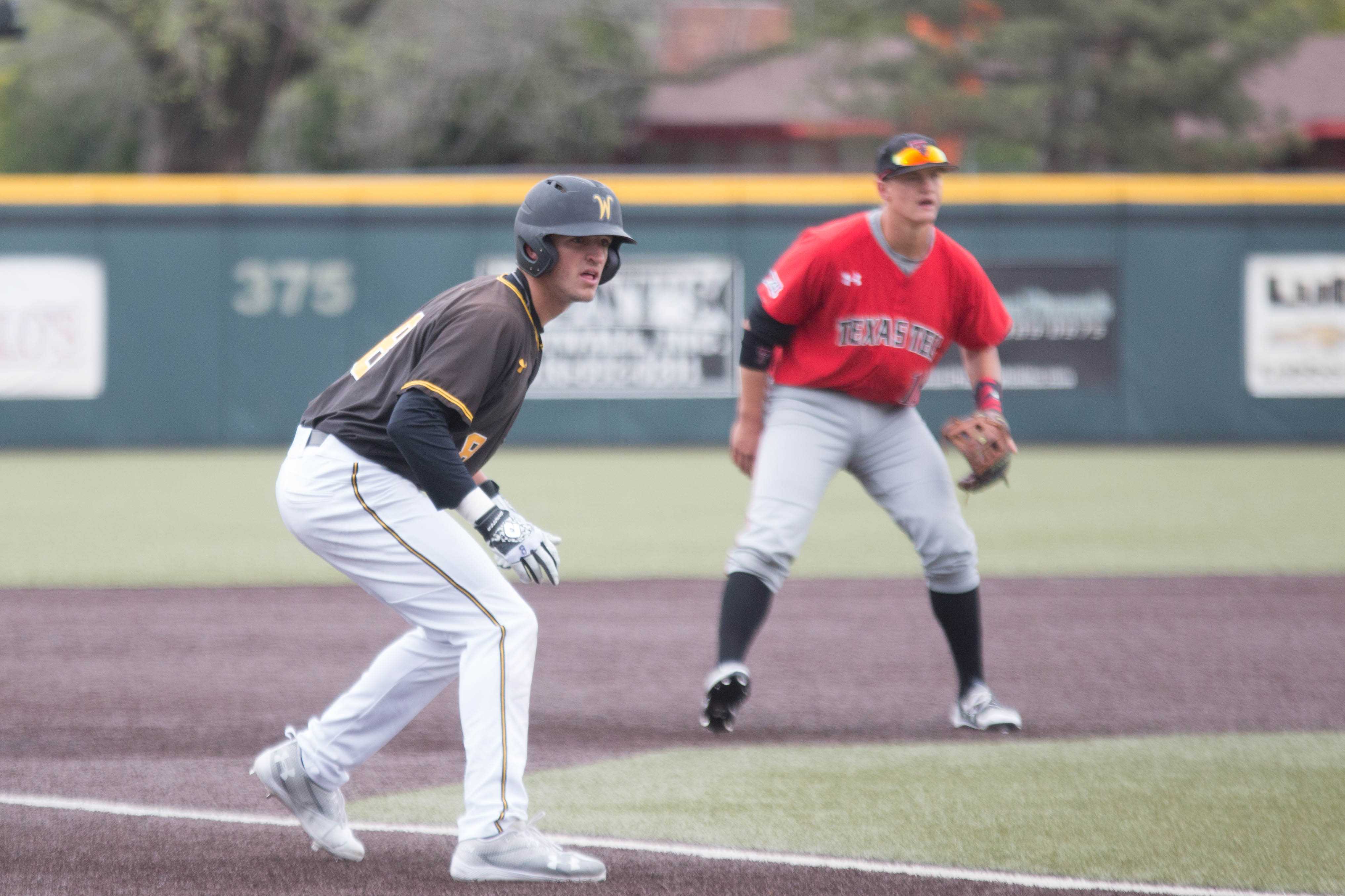 Freshman Jacob Katzfey waits for a chance to run to home base during the game against Texas Tech Saturday.