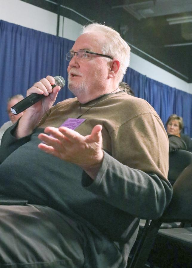 Bob Lutz asks Gregg Marshall a question during the post game press conference after Wichita State’s 78-63 win over Missouri State in the Missouri Valley Conference semifinal in St. Louis on March 4, 2017. This is Lutz’ last season covering Wichita State basketball as sports reporter for the Wichita Eagle.