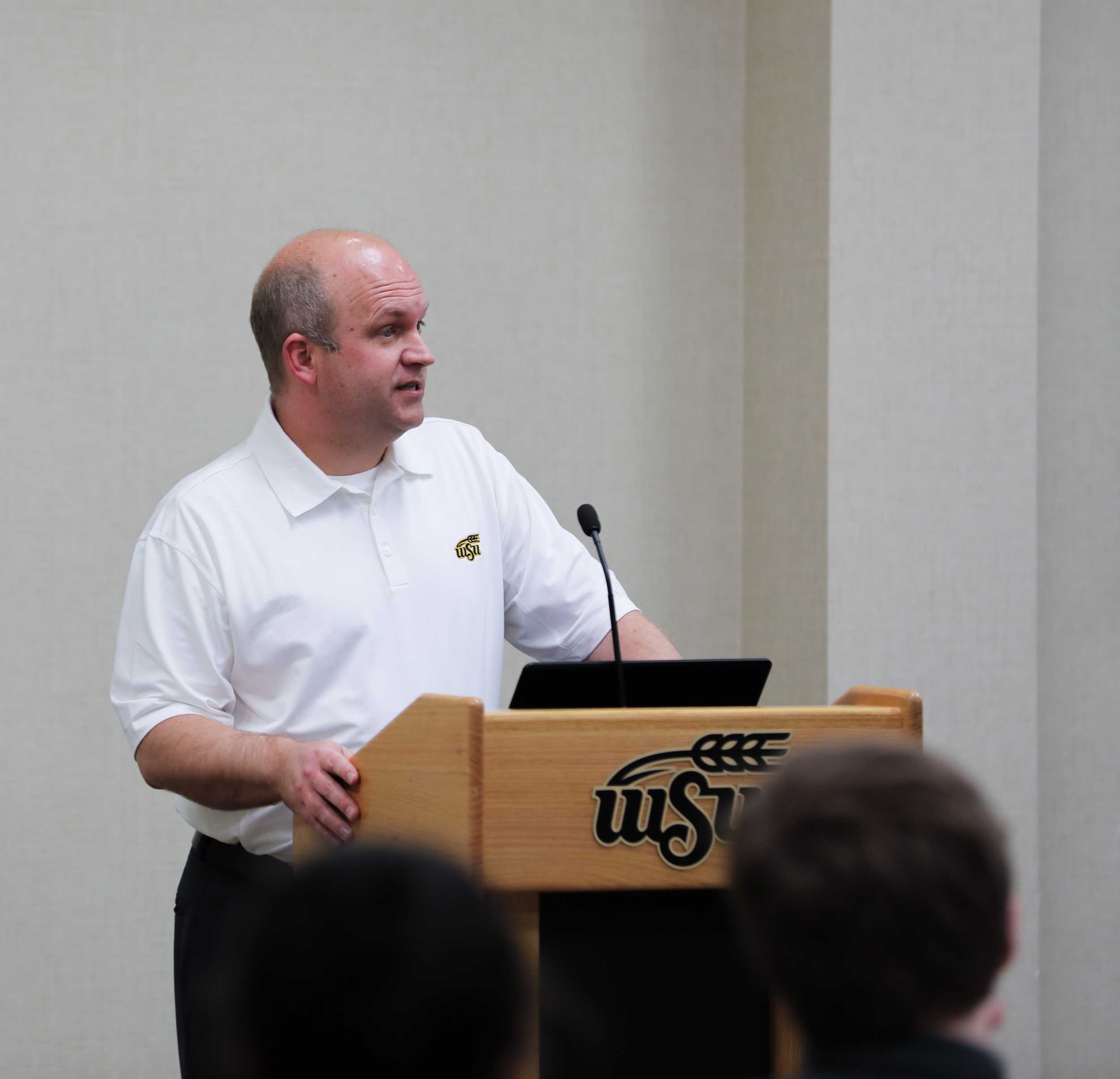 John Tomblin, vice president for research and technology transfer, speaks at a student government association meeting. Tomblin is the highest paid Wichita State employee. (File photo; Mar. 1, 2017)