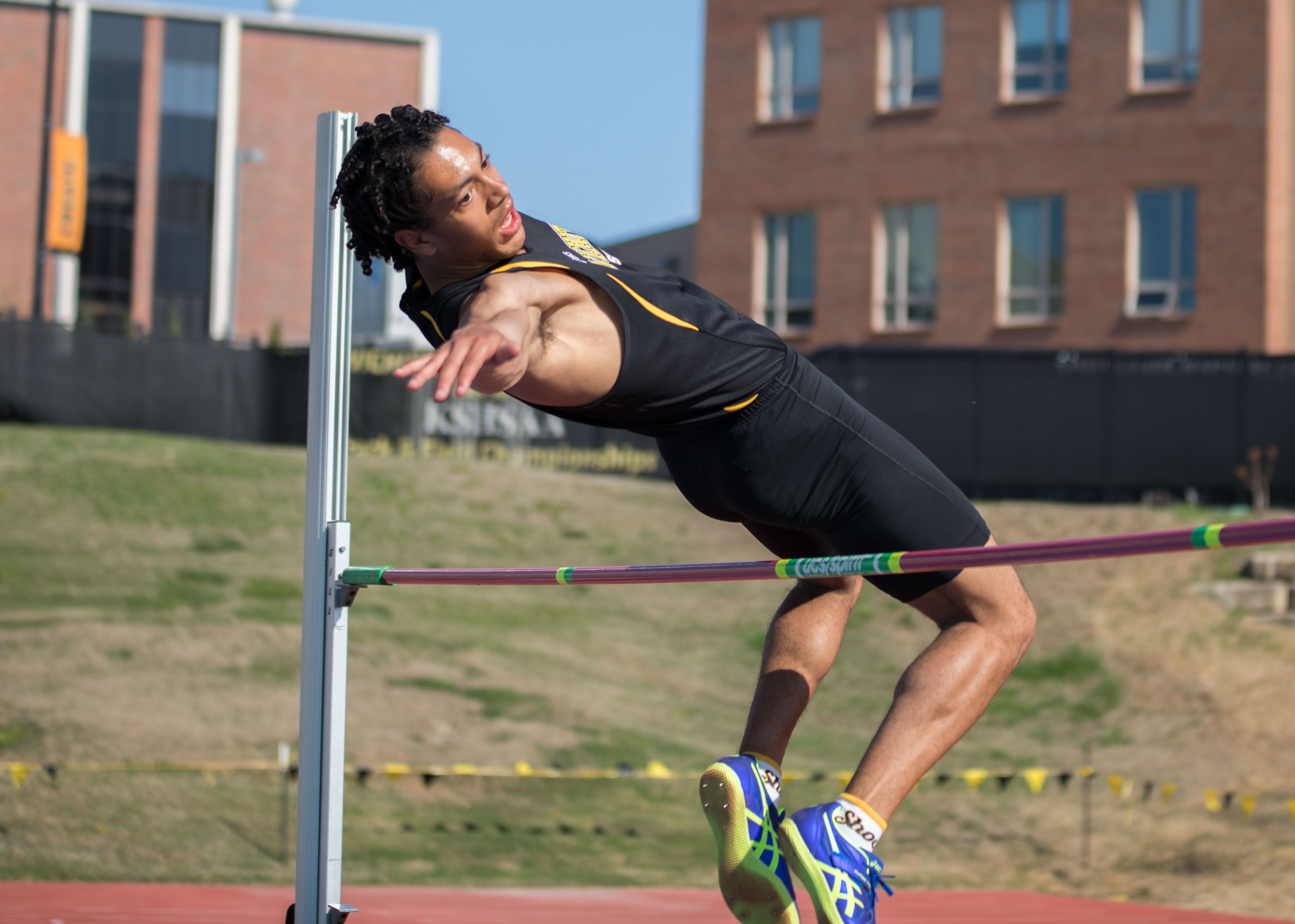 Kaden Griffin high jumps Tuesday in Cessna Stadium during the K.T. Woodman Multi-Events. Griffin won the Decathlon with a personal best of 6,816. (April 11, 2017)