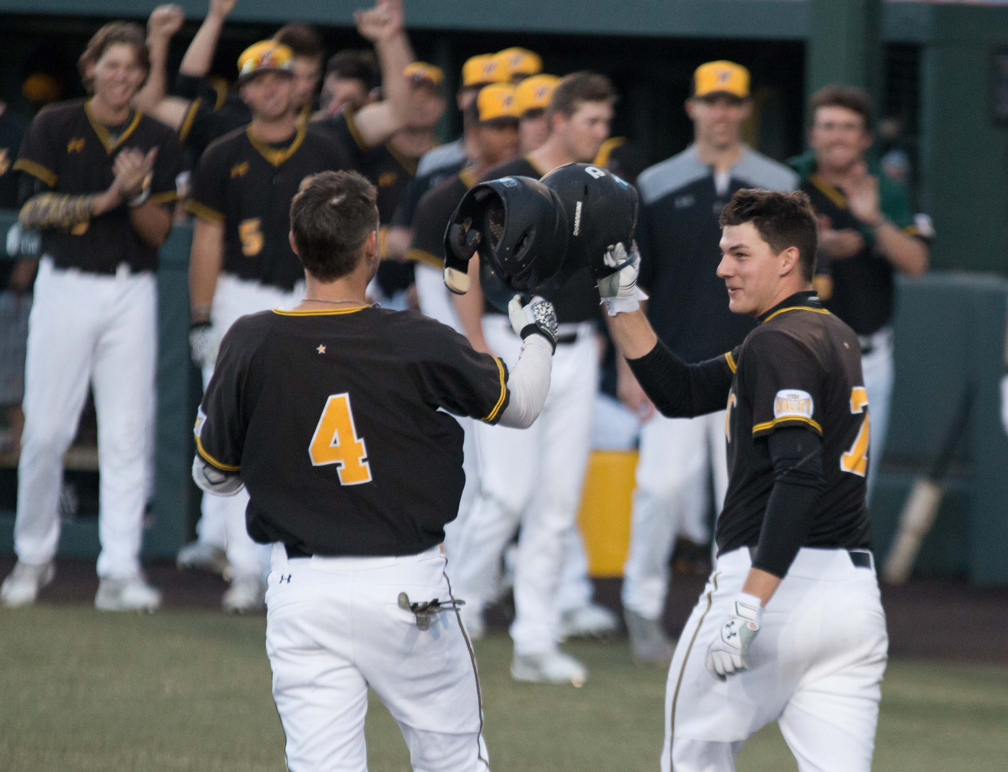Redshirt Sophomore Jordan Boyer and Redshirt Freshman Noah Croft celebrate Boyer's home run against Southern Illinois.