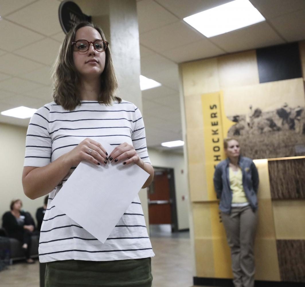 Student+Body+President+Paige+Hungate+responds+to+a+list+of+demands+presented+to+her+outside+the+Student+Government+Association+offices.+