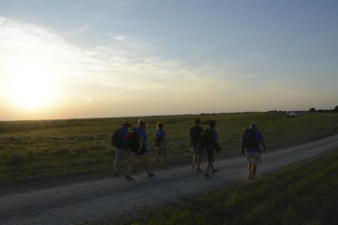 Student journalists get their hands dirty in the Flint Hills — and their feet