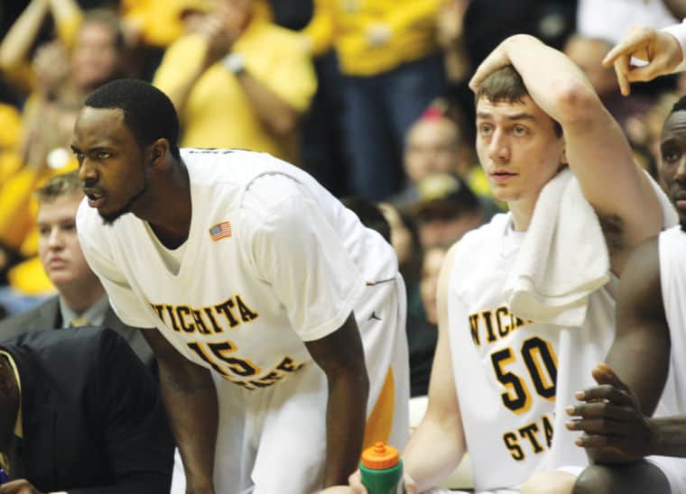 Nick Wiggins and Jake White look on from the bench in the Shockers 68-55 loss to Indiana State on Tuesday.
