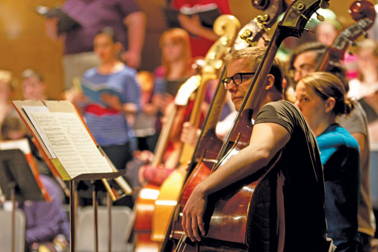 Students from WSU Concert Chorale, A Cappella Choir and Symphony Orchestra practice for the up and coming Oratorio Concert Sunday afternoon in Miller Concert Hall.
