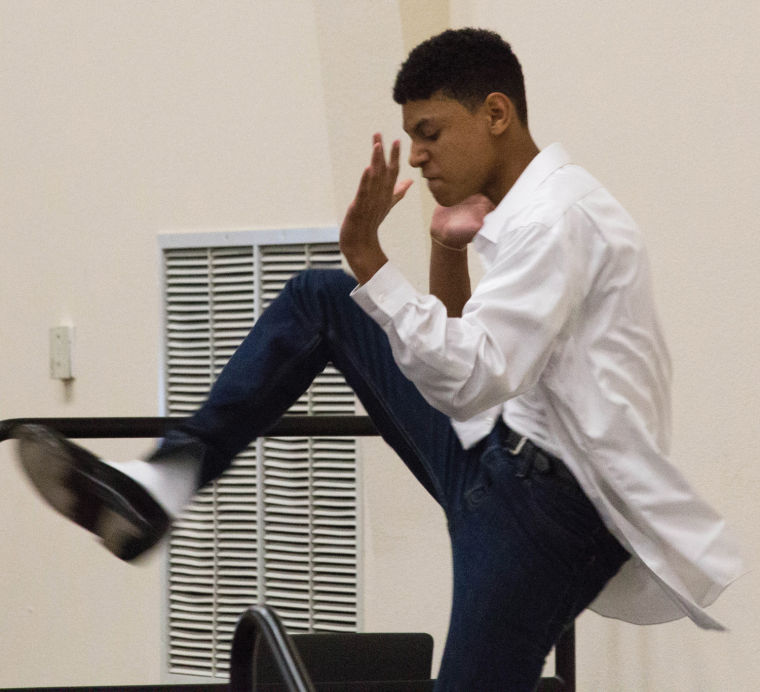 A+TRIO+student+dances+on+the+stage+to+Michael+Jackson+at+a+TRIO+dinner+on+Friday.+TRIO+is+a+federally-funded+program+for+unpriveleged+youth+interested+in+attending+college.