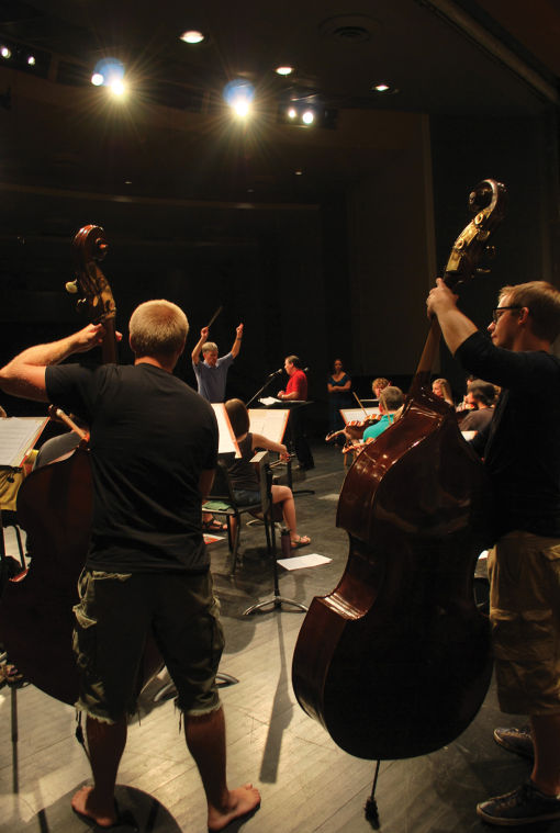 Faculty+and+students+practice+before+the+Summer+Orchestra+show+on+Friday%2C+July+19+at+7%3A30+p.m.