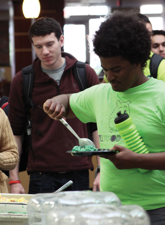 A large number of students came to eat green eggs and ham with their colleagues and President Bardo.