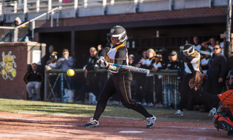 WSU batter takes a swing at the pitch during Saturdays game two against Cowley County Community College at Wilkins Stadium.