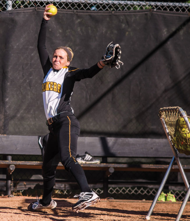 Freshman pitcher Jenni Brooks warms up in the bullpen prior to the game Saturday afternoon at Wilkins Stadium.