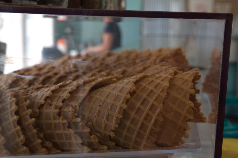 Freshly made waffle cones sit at College Hill Creamery, ready to be eaten. There are more than 20 flavors of ice cream to choose from at the shop.