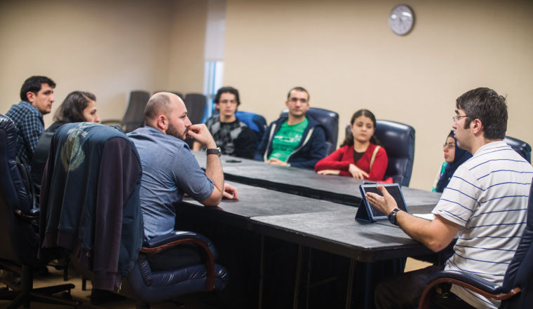 Muhammet Ceylon of the Turkish Learning Club deliberates with the rest of the group members during the meeting which are held Monday afternoons in Lindquist Building.