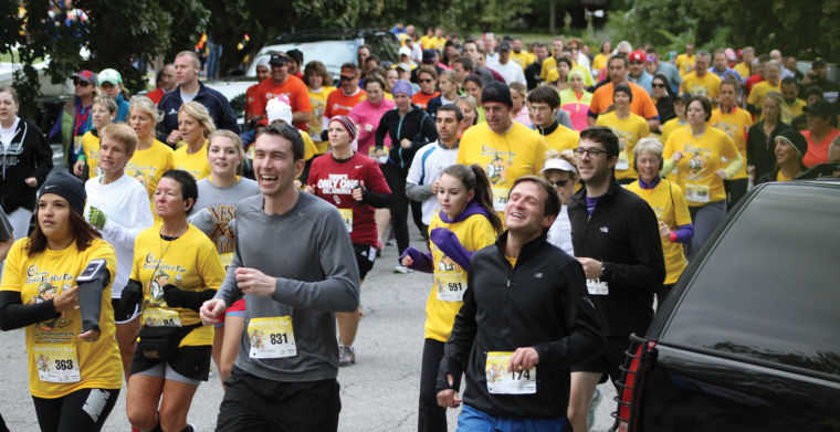 Everyone has a smile on their face as the Rosstoberfest Race begins. Hundreds turn out in support of the event.