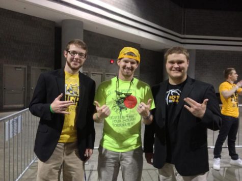 Isaac Stine (LEFT) and Sam Harp (RIGHT) played into Wichita’s reputation as the worst dressed city in America when they wore sport coats with their Shocker gear at the Final Four. They put up their Shockers before the game.