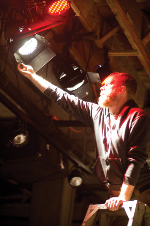 Torin Anderson prepares the lighting prior to the WSU professors performing at the Fisch Haus as part of the KNOB New Music Festival. The KNOB New Music Festival runs Thursday, November 7th through Saturday, November 9th at 8pm.
