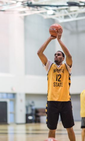 Transfer student Darius Carter warms up with free throws during practice at the Multipurpose gym which is located inside the Koch Arena. He signed with Wichita State in the Spring of 2013.