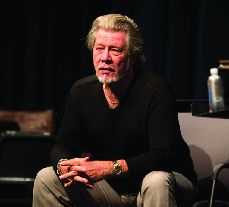 Sam Ramney speaks at Miller Concert Hall to students and faculty about his life experiences as a professional opera singer.