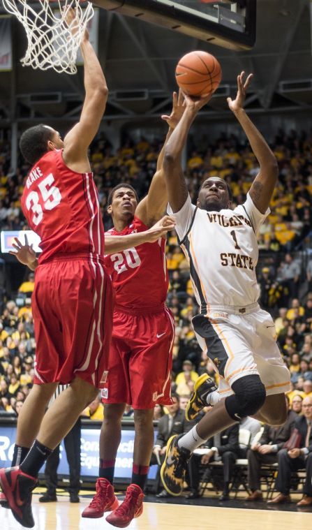 Freshman Derail Green drives into the basket for a lay-up against Bradley defenders during Tuesday nights game at Charles Koch Arena. Green shot eight points for the night as the Shockers remain undefeated by beating Bradely 72-50.