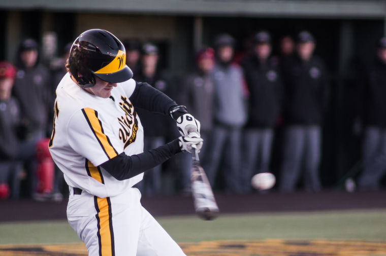 Sophomore+Parker+Zimmerman+hits+a+single+during+Fridays+game+against+SIU-+Edwardsville+at+Eck+Stadium.+The+Shockers+won+6-1.