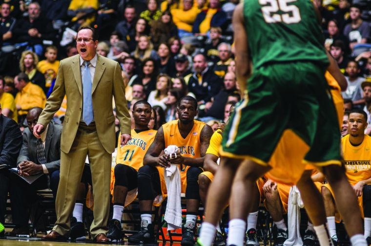 Coach Gregg Marshall directs the team during the WSU-Oklahoma Baptist game on Saturday night at Koch Arena. The Shockers won 73-29.