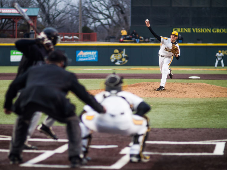 Freshman+Sam+Tewes+winds+up+for+his+pitch+during+game+two+of+the+double-header+against+Long+Beach+State+Friday+afternoon+at+Eck+Stadium.The+Shockers+lost+7-0.