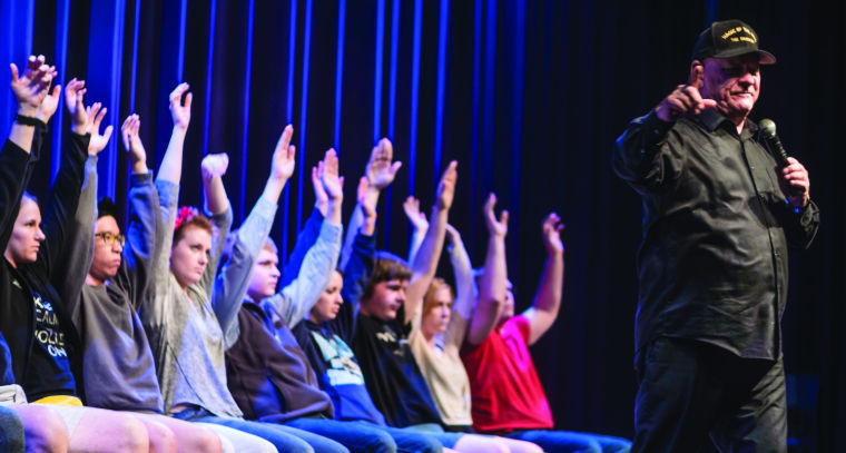 Hypnotist: The Sandman hypnotizes participants Thursday night inside the CAC Theater. The event was sponsored by SAC.