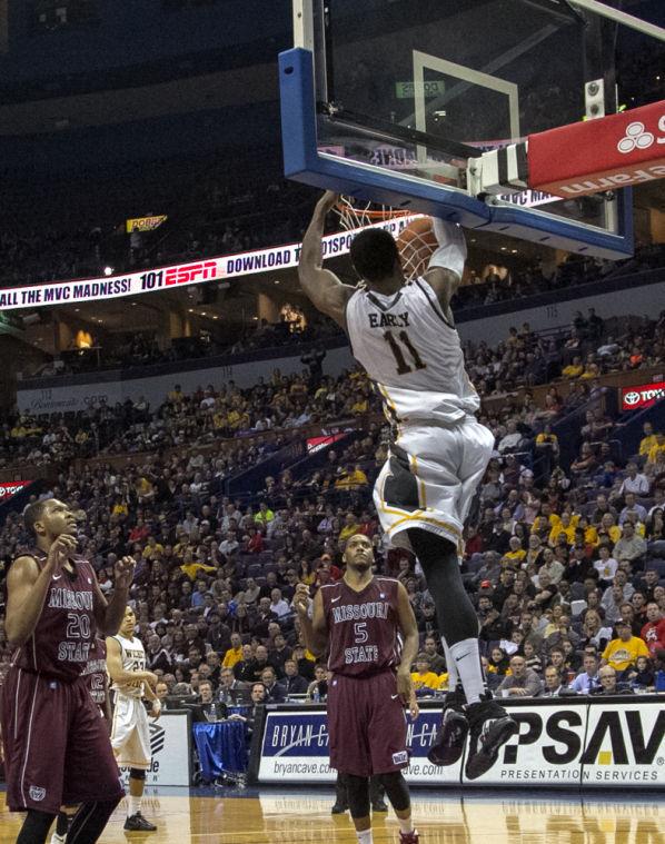 Cleanthony Early slams down an alley-oop from Fred VanVleet in Saturday's game. Early scored 20 points in the 67-42 victory to send the Shockers to the MVC Final game Sunday.
