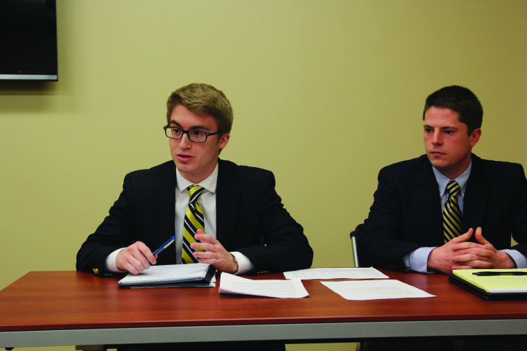 Matthew Conklin and Brandon Baltzell speaking during The Sunflower's SGA presidential debates on Friday.