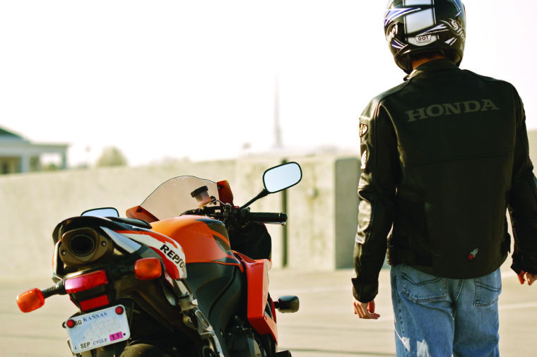 To stay safe while riding a motorcycle, wear a helmet to protect your head from serious injury.