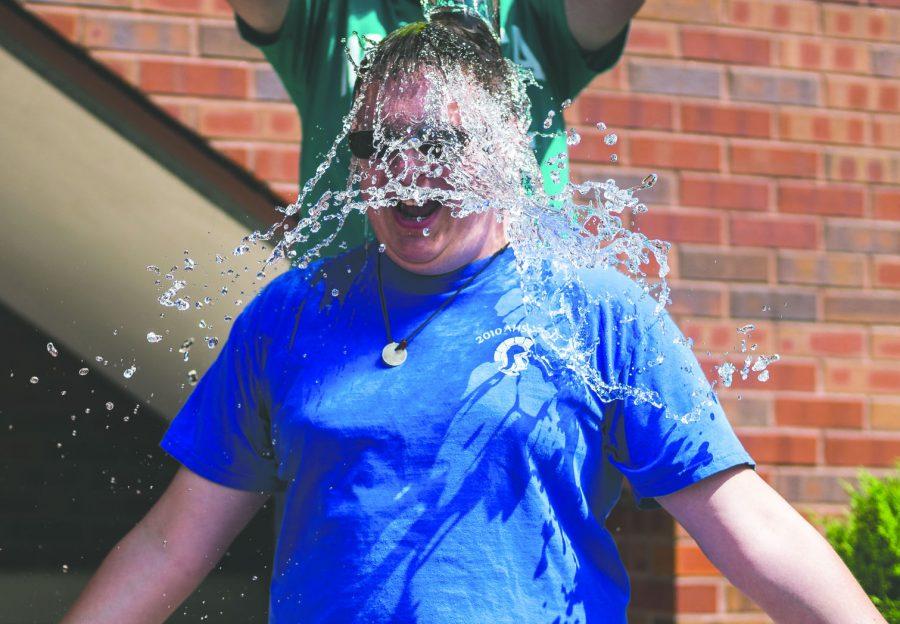 Sunflower+Editor-in-Chief+TJ+Rigg+is+doused+with+water+as+part+of+the+ALS+ice+bucket+challenge.+Rigg+and+the+rest+of+the+Sunflower+staff+were+challenged+by+business+manager+Robbie+Norton%2C+who+dumped+the+water+on+Rigg.