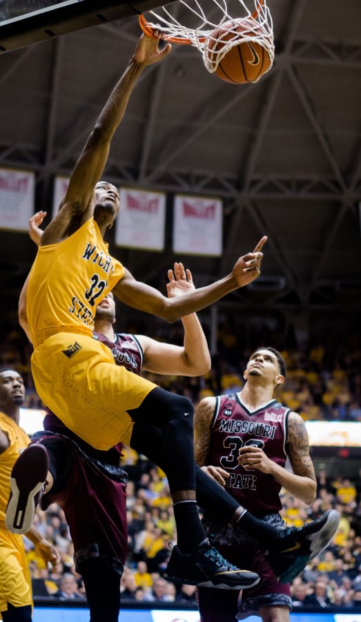 Freshman Markis McDuffie stuffs the ball Thursday night against Missouri State at Charles Koch Arena. It was one of 10 slam dunks for the Shockers as they went on to defeat the Bears 99-68.