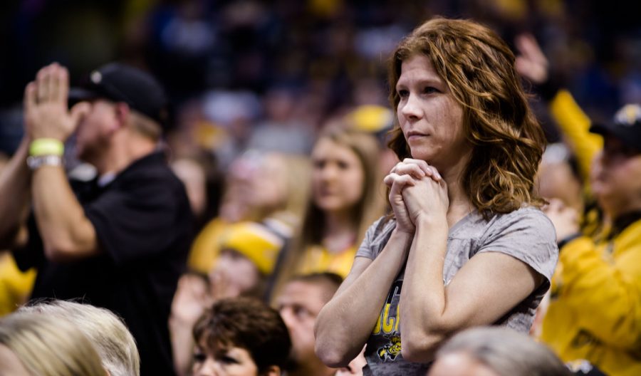 A+Wichita+State+fan+anxiously+awaits+the+outcome+of+the+semifinal+game+versus+Northern+Iowa+in+St.+Louis+on+Saturday.