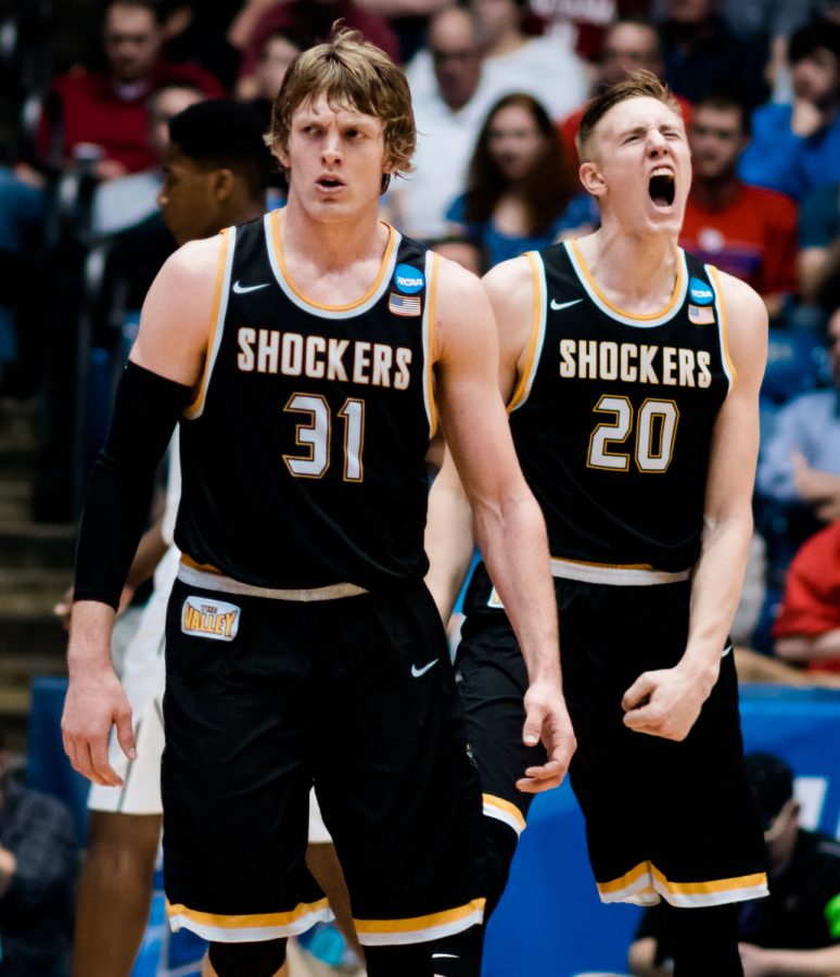 Sophomore forward Rauno Nurger celebrates a Vanderbilt turnover with teammate Ron Baker. Nurger scored six points in 17 minutes of action. 