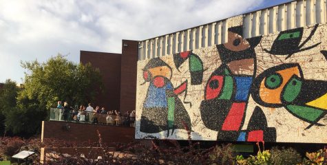 Attendants to Tuesday’s Joan Miró mosaic reception enjoy the view of the restored Personnage Oiseaux, or “Bird People,” mosaic. The mosaic’s restoration was a nine year process.