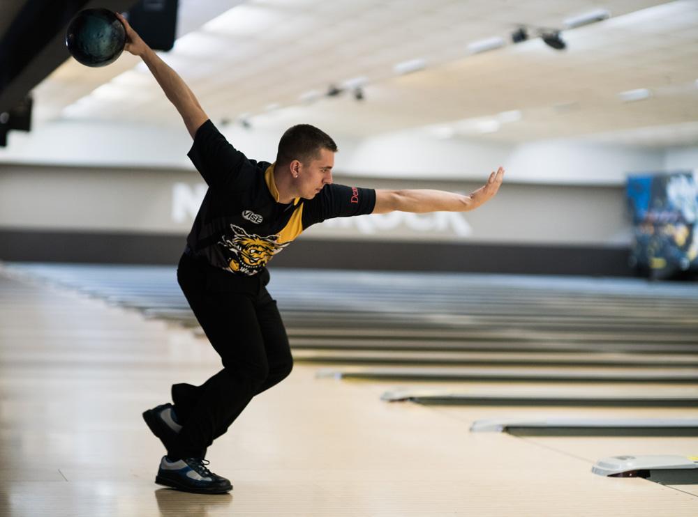 Douglas Wagner slides into a release during a team practice at North Rock Lanes. Wagner was selected to join Wichita State’s bowling team this year after transferrring schools.