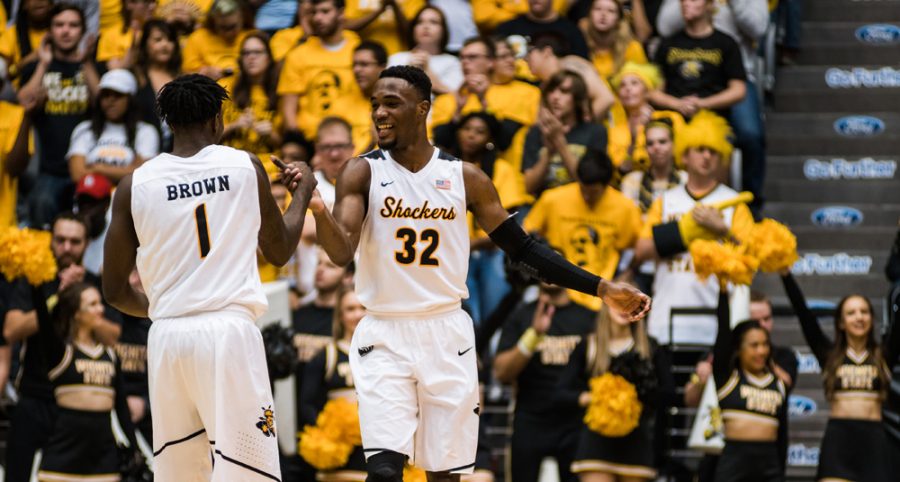 Sophomore+Markis+McDuffie+%2832%29+celebrates+with+junior+Zach+Brown+%281%29+in+the+second+half+of+Wednesday%E2%80%99s+game+against+Tulsa+at+Charles+Koch+Arena.+Wichita+State+defeated+Tulsa+80-53.