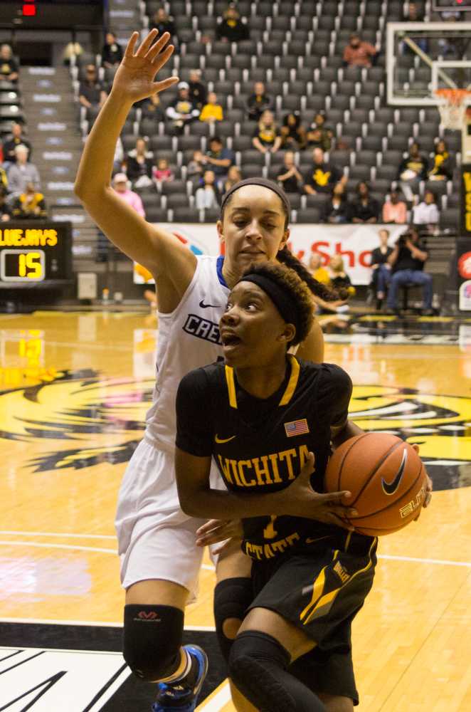 Junior guard Keke Thompson drives to the lane on Sunday against Creighton. Thompson knocked in two free throws to tie the game late, but UMKC won 56-54 on Tuesday. Photo by Hannah Roberts