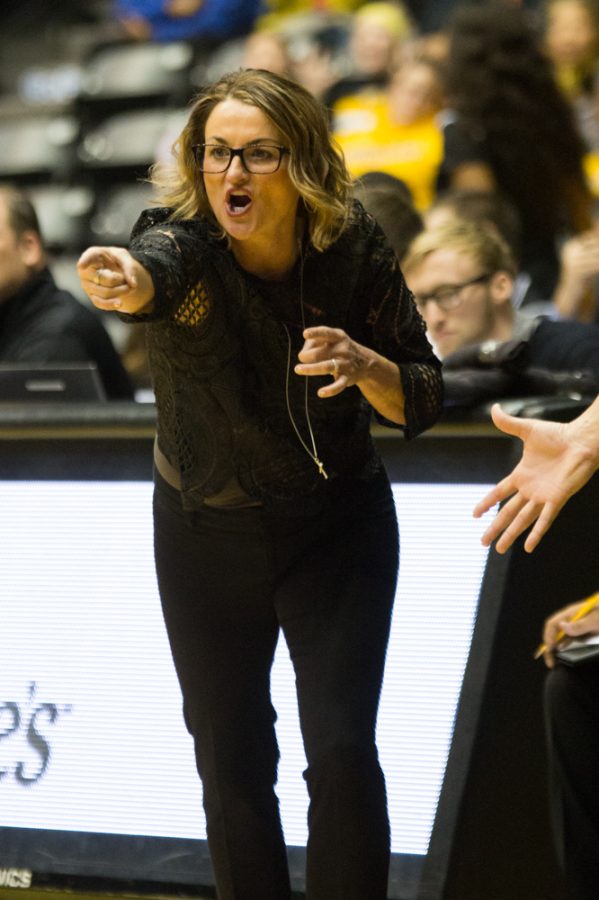 Head coach, Jody Adams-Birch, yells at the referee about a perceived missed call Sunday afternoon. The game marked the beginning of Adams-Birch’s ninth season coaching the Wichita State women’s basketball team.