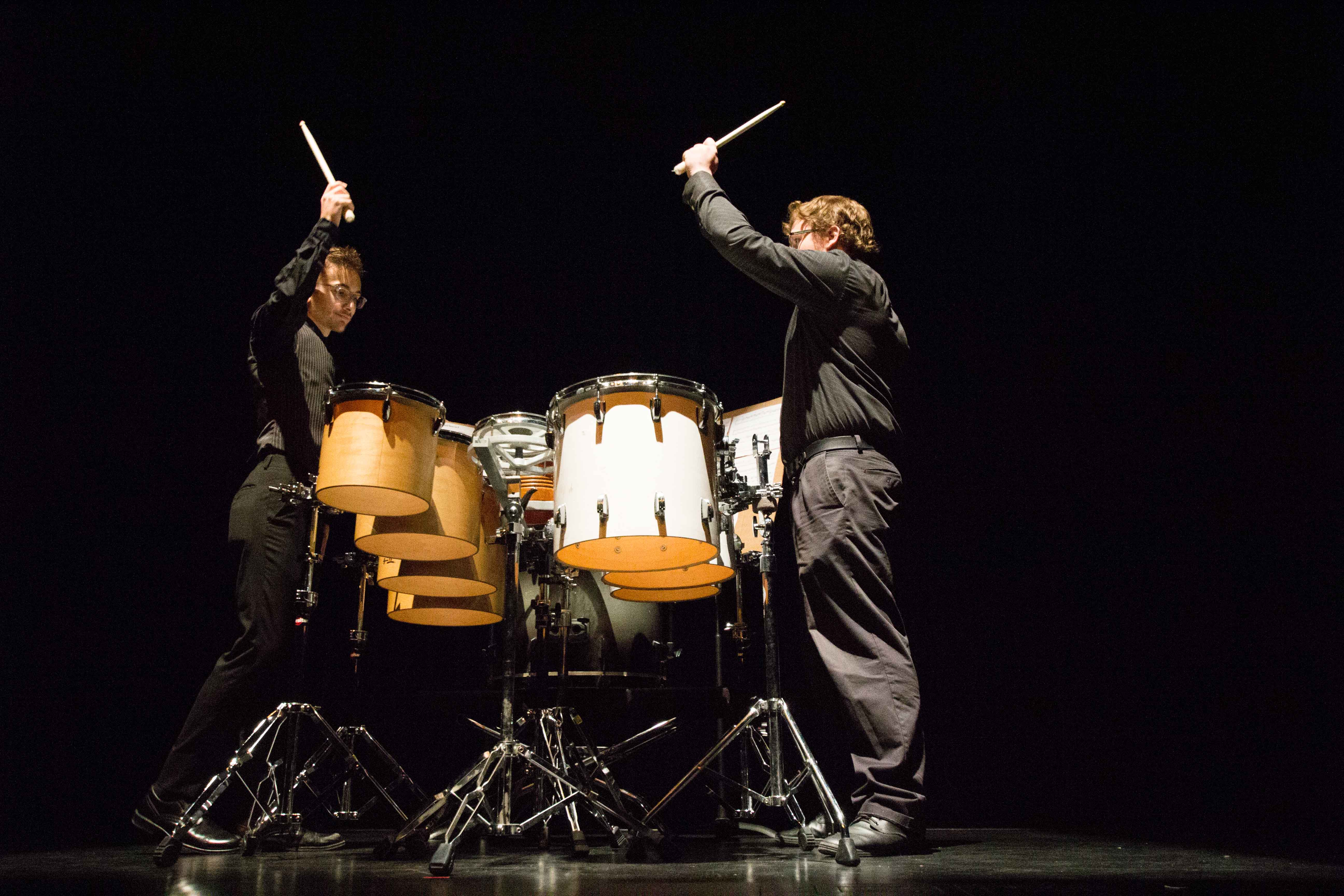 Juniors Daniel Furry (left) and Spencer Weaver (right) play “Eight on 3 and Nine on 2” composed by G. Clements and R. Marino on a multiple percussion setup on Sunday evening during the Impulse Percussion Group’s concert. Furry and Weaver have been rehearsing the piece since the beginning of the summer.