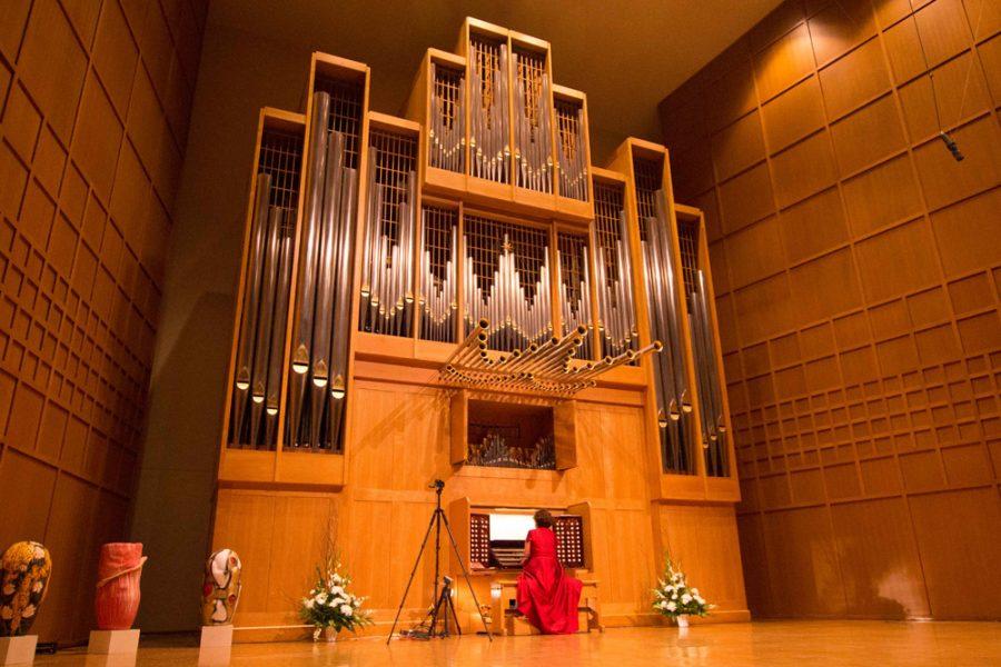 Organist Lynne Davis preforms Tuesday night as part of the 30th anniversary ceremony of Weidemann Hall.