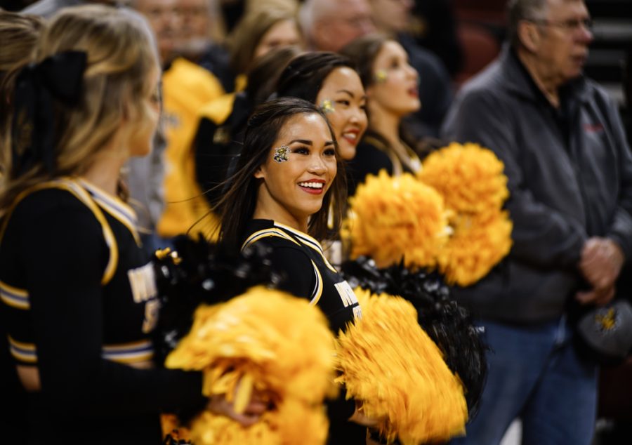 A member of the cheer squad entertains the crowd prior to the annual INSTRUST Bank Arena game against OSU Saturday evening. 