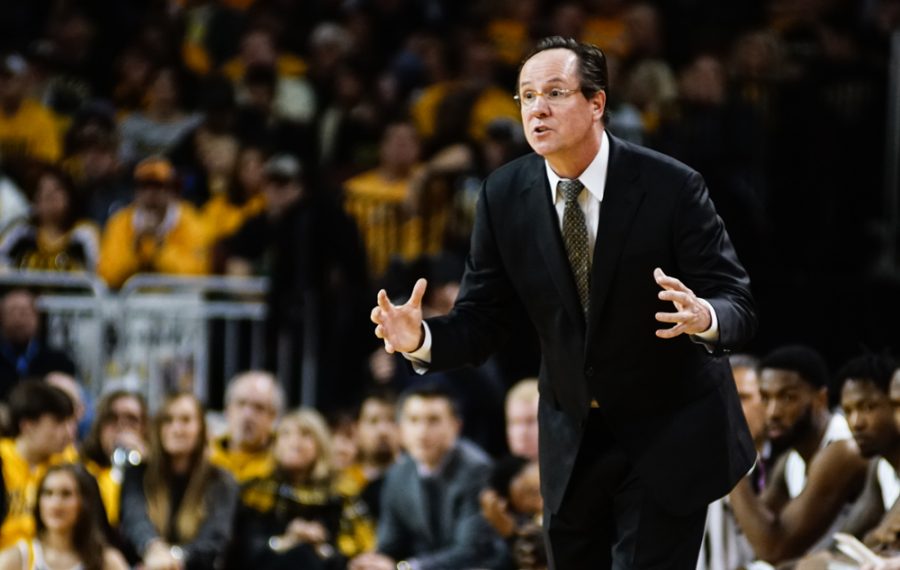 Coach Gregg Marshall screams at his player in frustration in the first half during the annual INSTRUST Bank Arena game Saturday evening. The Shockers fell to Oklahoma State by the score of 93-76.