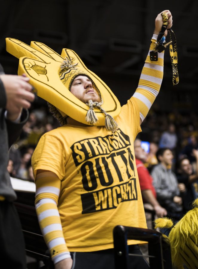 A fan celebrate a score by the Shockers during Wednesdays game against Drake at Charles Koch Arena. (Jan. 4, 2017)
