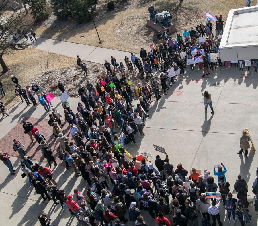 A crowd gathers outside the Rhatigan Student Center for the No Ban, No Wall peace rally in November 2016.