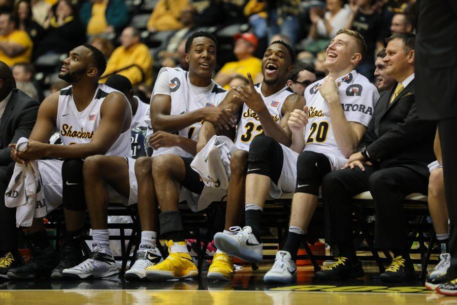 Wichita State’s bench celebrates an Eric Hamilton three-pointer late in the second half against Southern Illinois. Hamilton scored 8 points in a total five minutes of play. (Jan. 24, 2016)