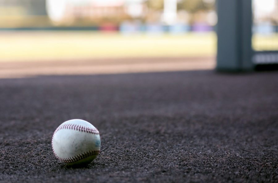 A lone baseball sets on the edge of the dugout at Eck Stadium.