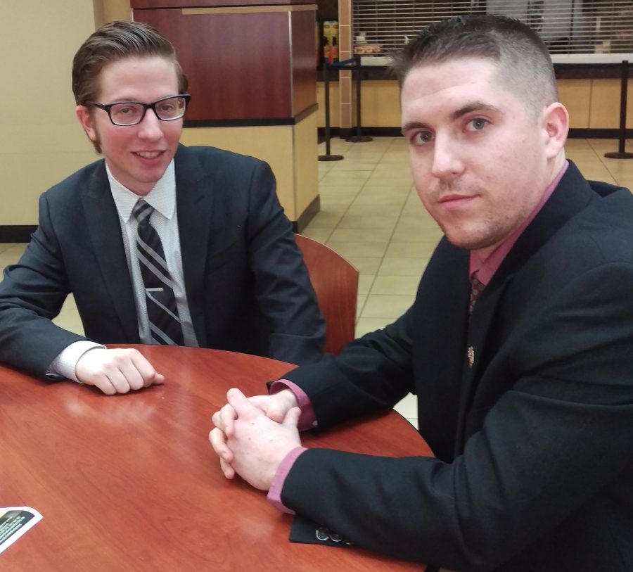Cale Ostby, left, and Dan Corrieri talk about the issue of concealed carry on campus. (Feb. 15, 2017)