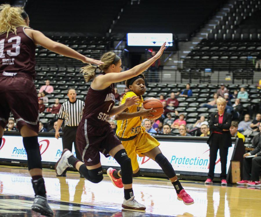 Keke Thompson drives into the lane Sunday afternoon against Missouri State. Wichita State lost 60-65.