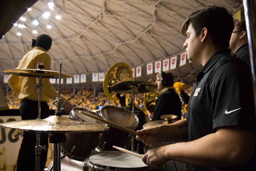 Wyatt Vieux, a member of the Shocker Sound, plays the drums during the game against Illinois State Saturday night. (Feb. 4, 2017)
